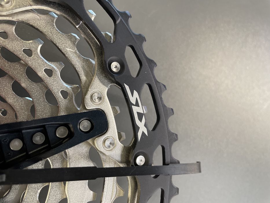 Kaseta Shimano CS M7100  SLX 12