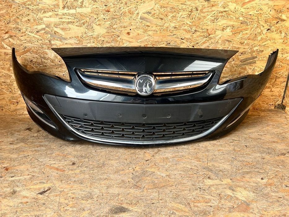 ZDERZAK PRZEDNI przód OPEL ASTRA J IV 4 LIFT PDC Halogeny