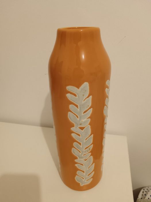 Jarra de flores laranja
