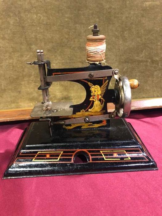 Máquina costura miniatura