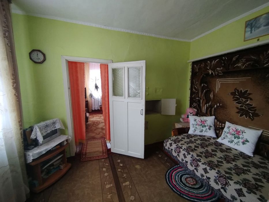 Продається частина будинку в центральній частині м.Малина