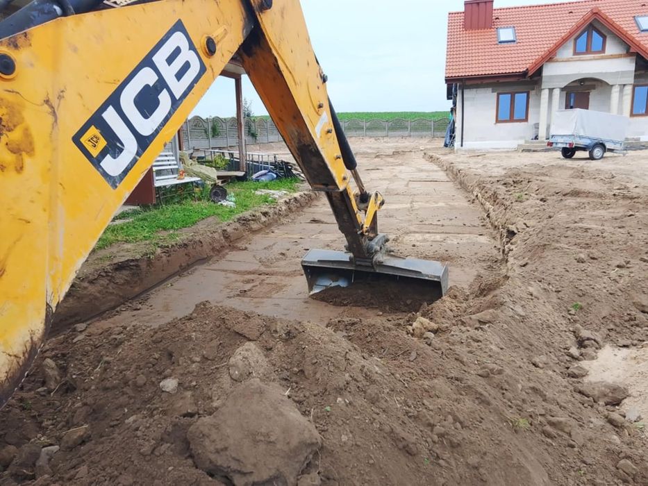 Usługi koparko-ładowarką koparka wykopy melioracja piasek ziemia czarn