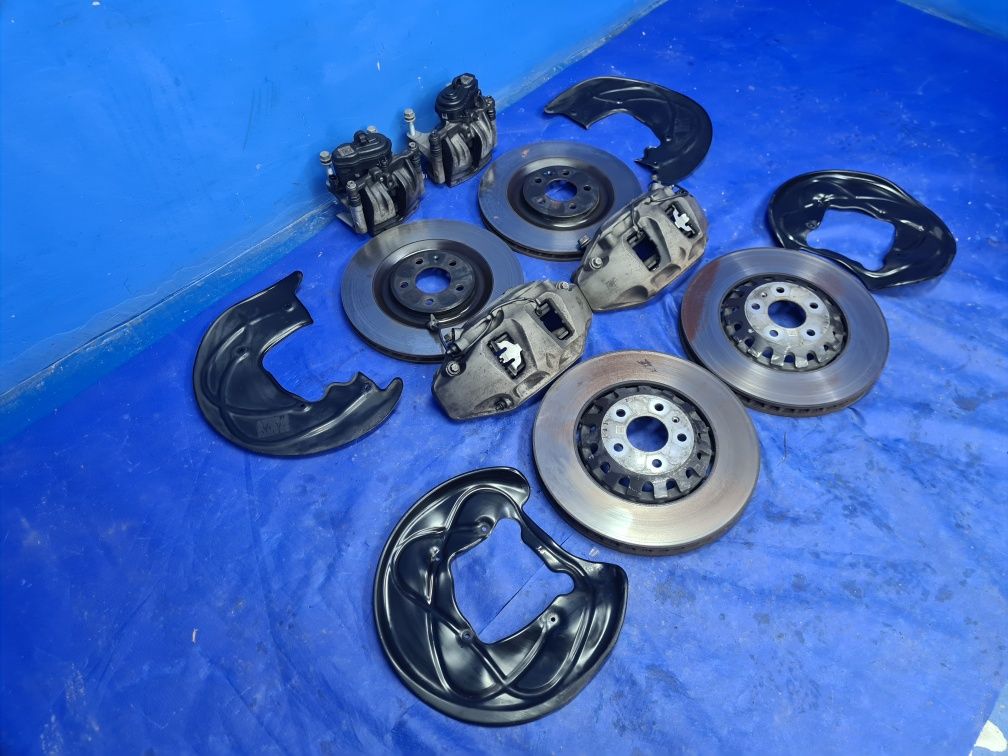 KOMPLET tarcz 375mm 340mm zaciski 6-tłoczkowe AUDI Q7 4M A6 C7 C8 OEM
