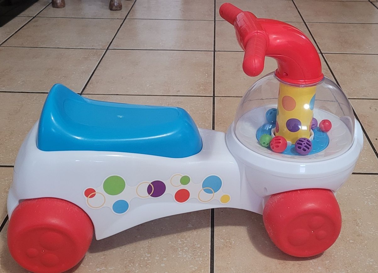 Fisher Price Jeździk z wirującymi piłkami