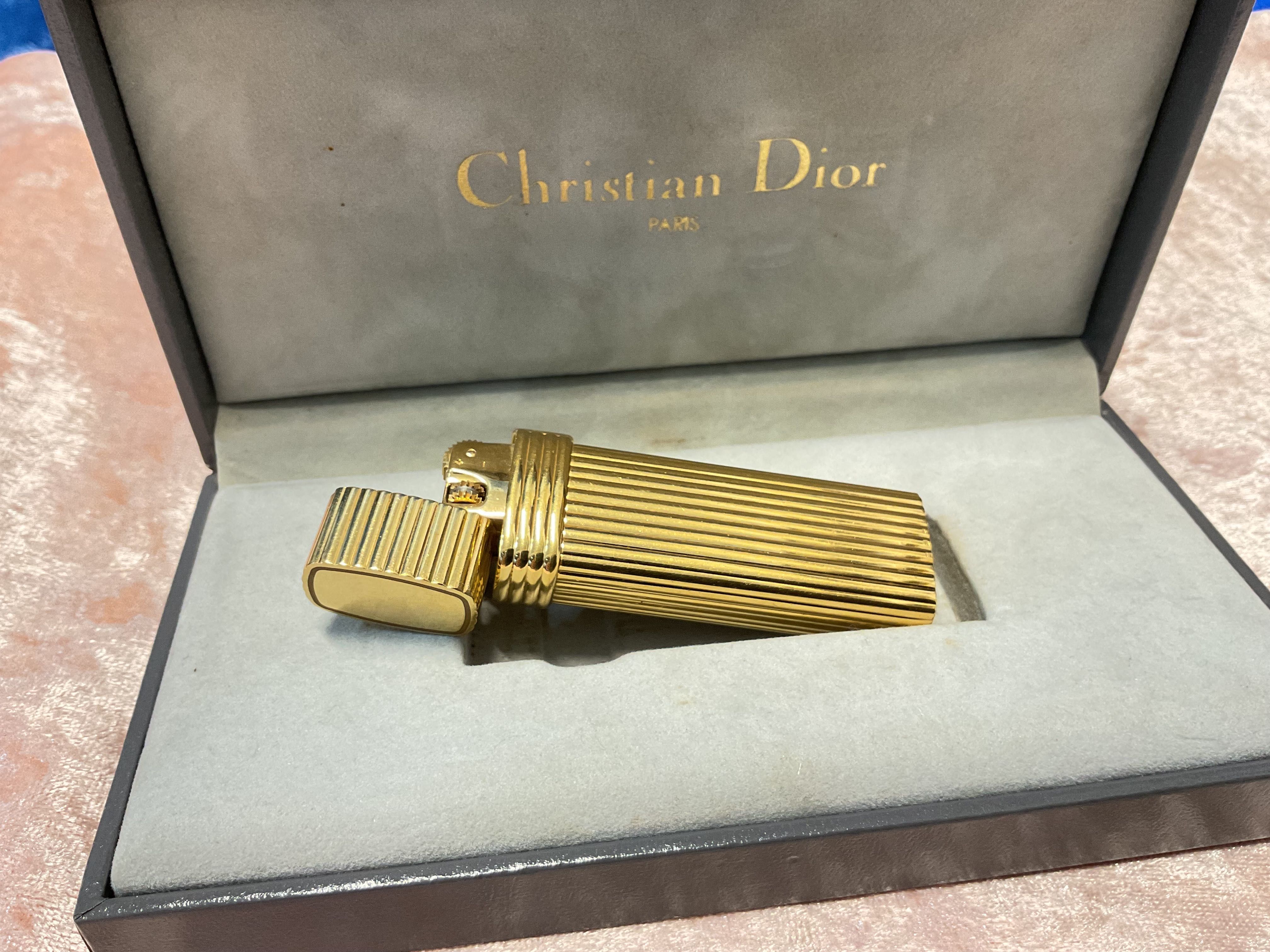 Isqueiro Christian Dior ,discrição abaixo