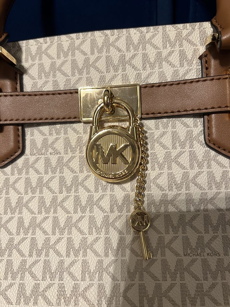 Torebka skórzana Michael Kors w kolorze kremowo brązowym