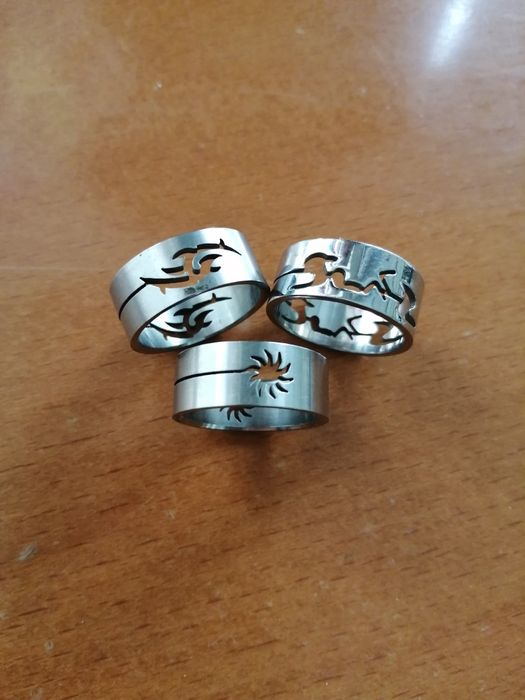 Anéis e pulseira em aco