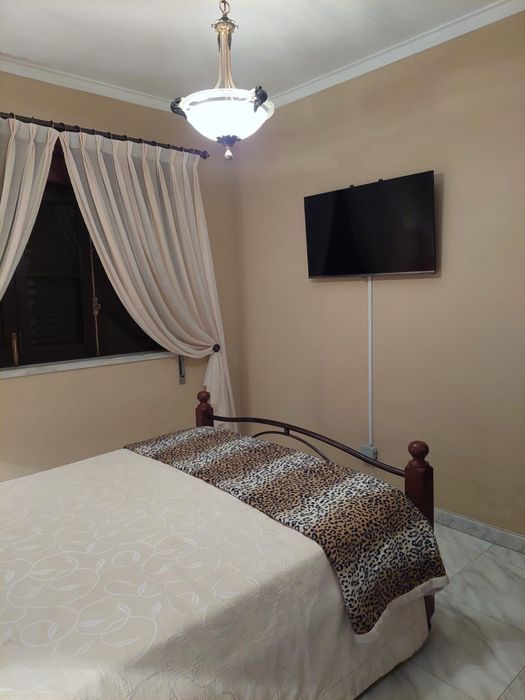 Quarto aconchegante para uma pessoa