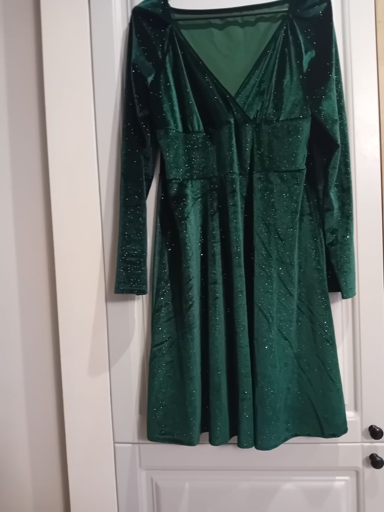 Nowa sliczna elegancka sukienka damska