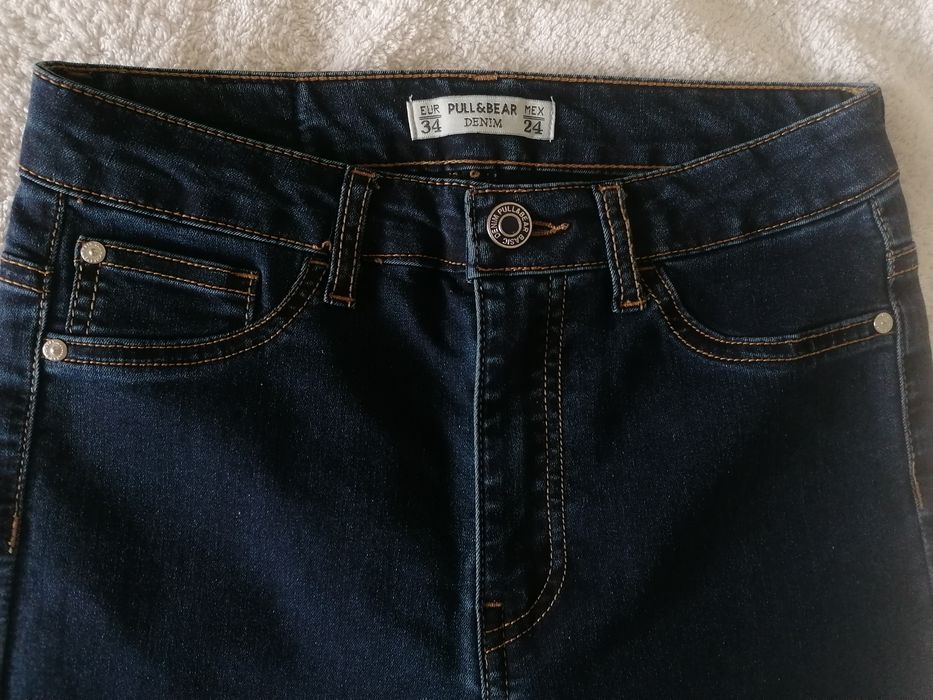 NIE NOSZONE granatowe spodnie PULL&BEAR rozmiar 34