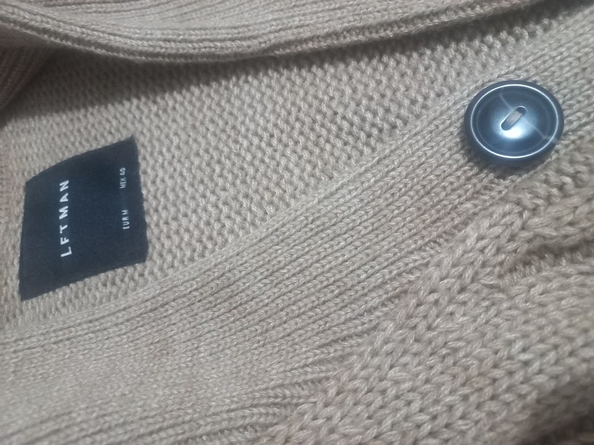 Casaco de malha com bolsos