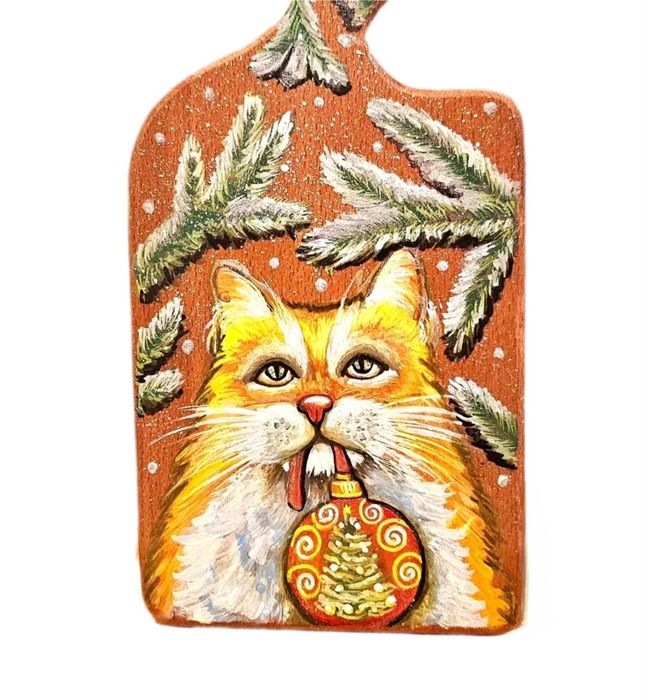 Kot na drewniany desce