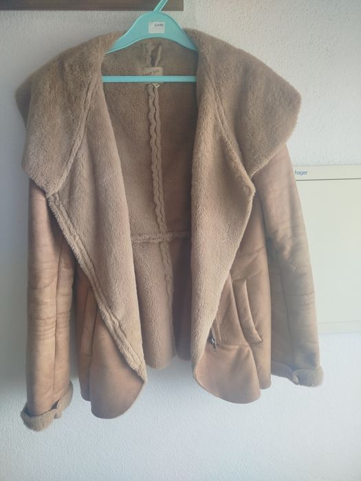 Casaco como novo