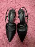 Sapatos pretos da Aldo