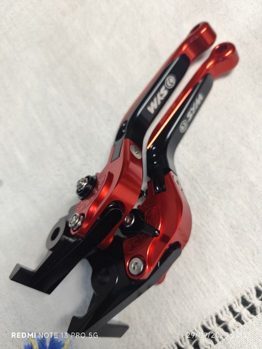 Manetes SYM  vermelho metalico
