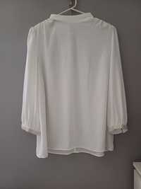 Biała damska elegancka koszula bluzka na lato z rękawami z ozdobnymi p