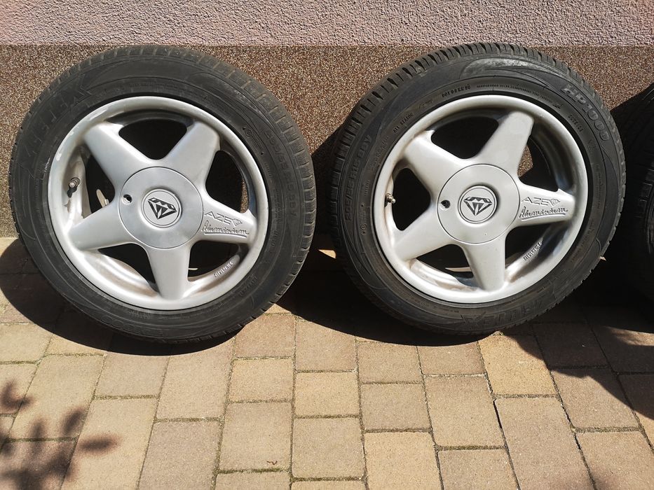 4x felga aluminiowa 15" 4x114.3 ET40 plus opony wielosezonowe