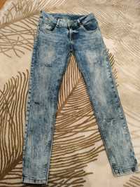 Damskie spodnie jeans rozm 40 L