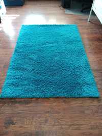 Nowy dywan turkusowy