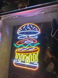 Neon “hamburger” sign
