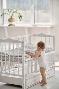 Дитяче ліжечко для новонароджених "АНГЕЛІНА" з відкидною боковиною.