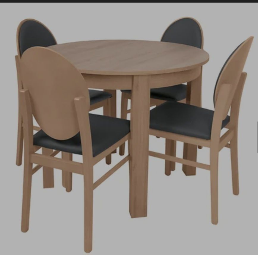 Rozkładany stół okrągły i 4 krzesła.