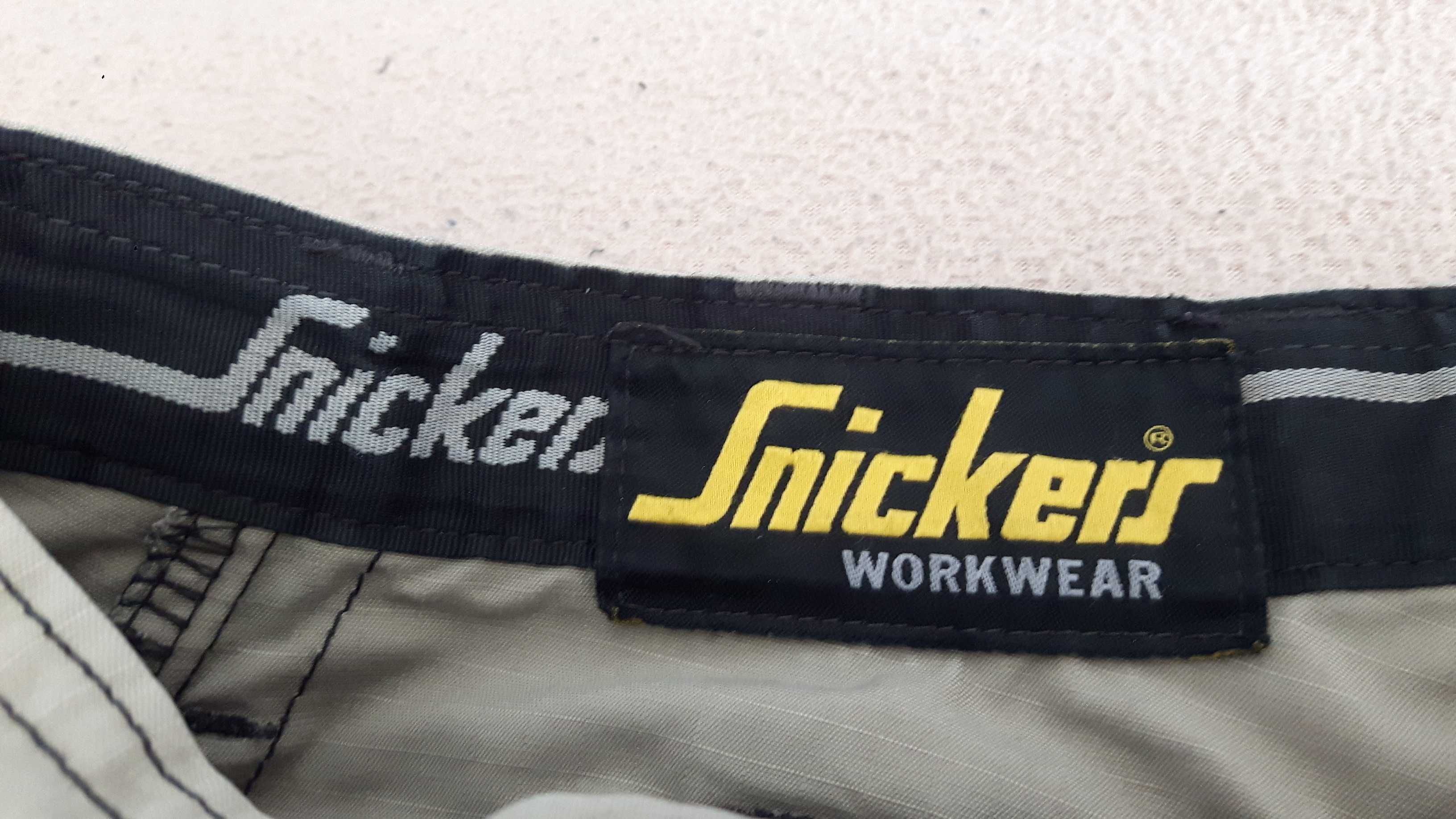 SNICKERS UŻYWANE spodenki robocze typu rybaczki beżowo czarne rozm. 48
