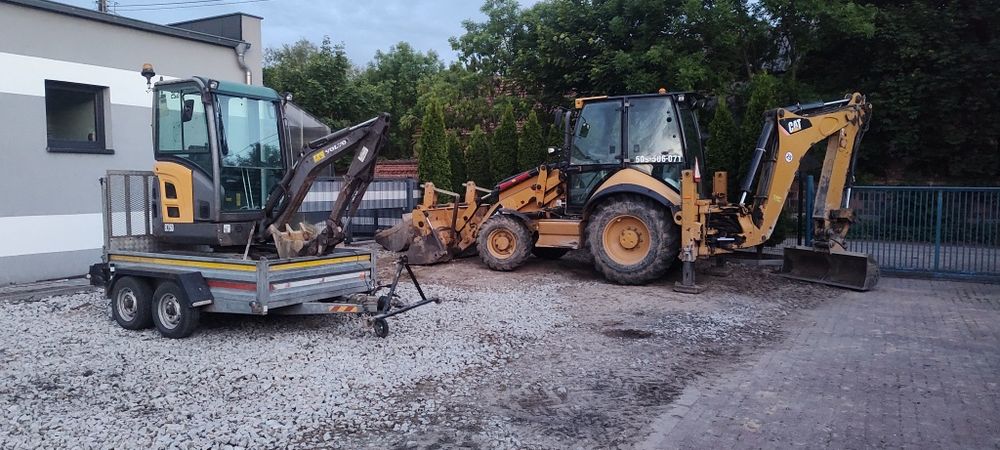 Roboty Ziemne Usługi koparko  ładowarką CAT Pracę Ziemne Odśnieżanie