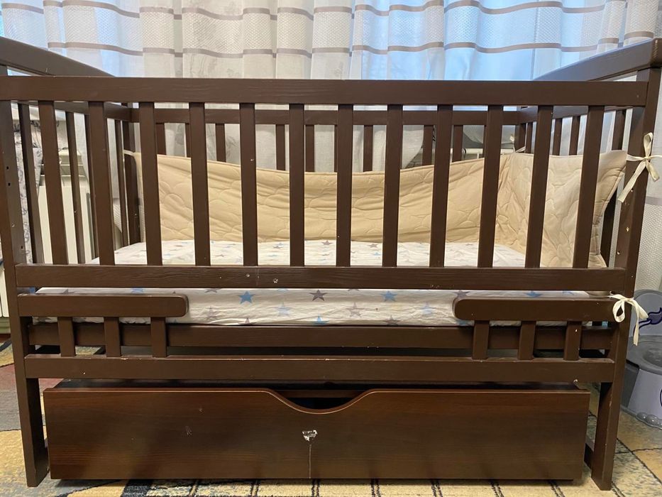 Дитяче ліжко для новонароджених