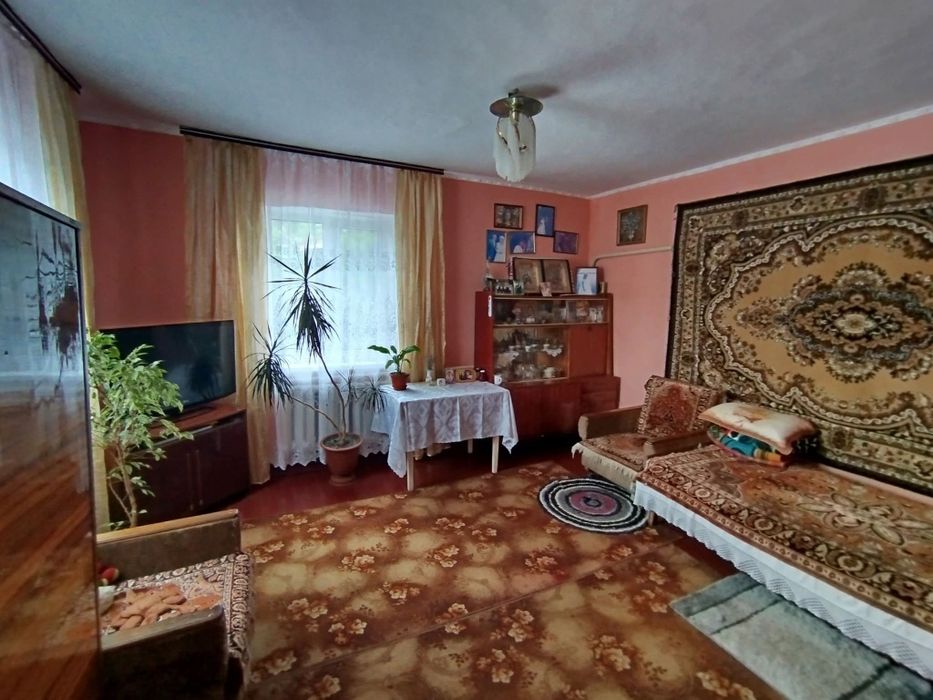 Продається частина будинку в центральній частині м.Малина