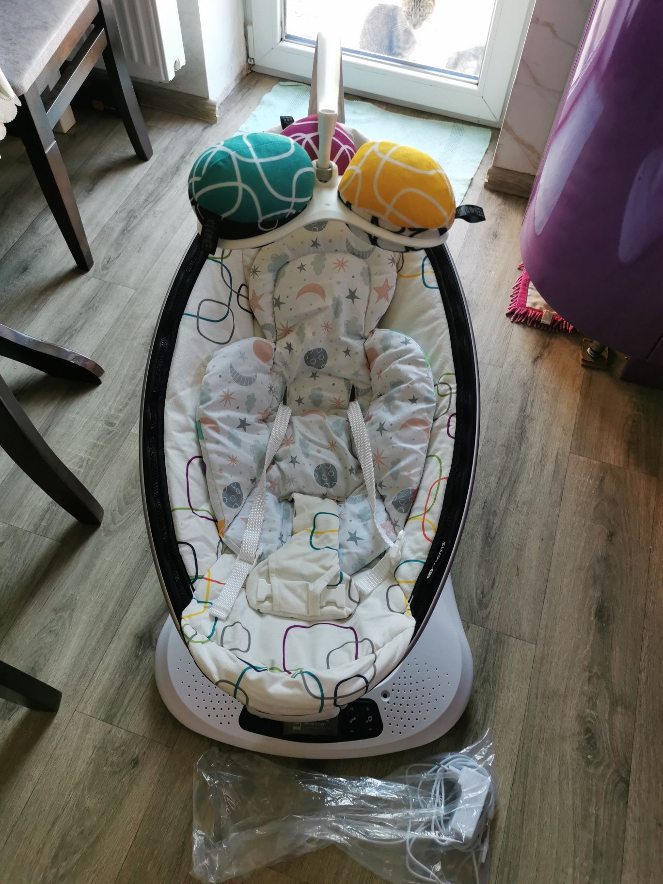 Заколисуючий центр 4moms