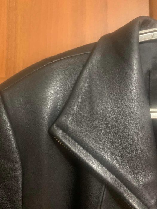 Жіночій плащ шкіряний