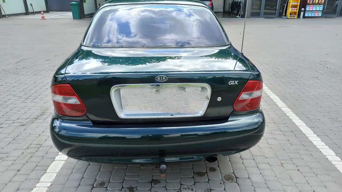 Автомобиль киа кларус