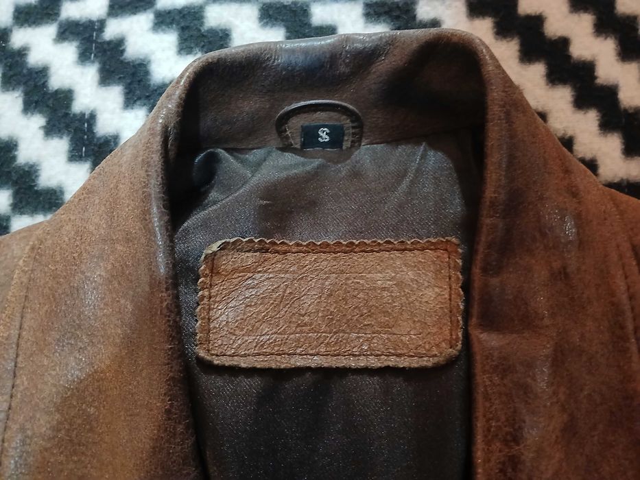 Casaco em pele verdadeira