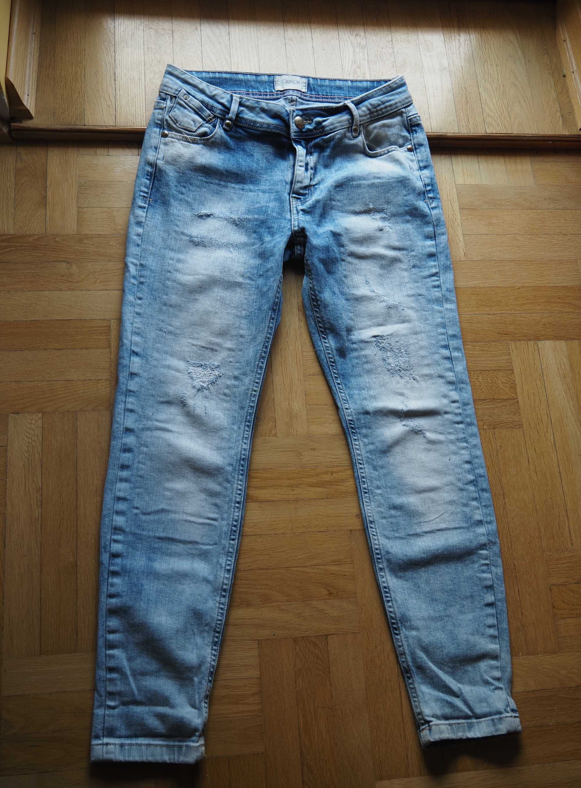 Jasne jeansy z przetarciami Cartoon stan idealny M