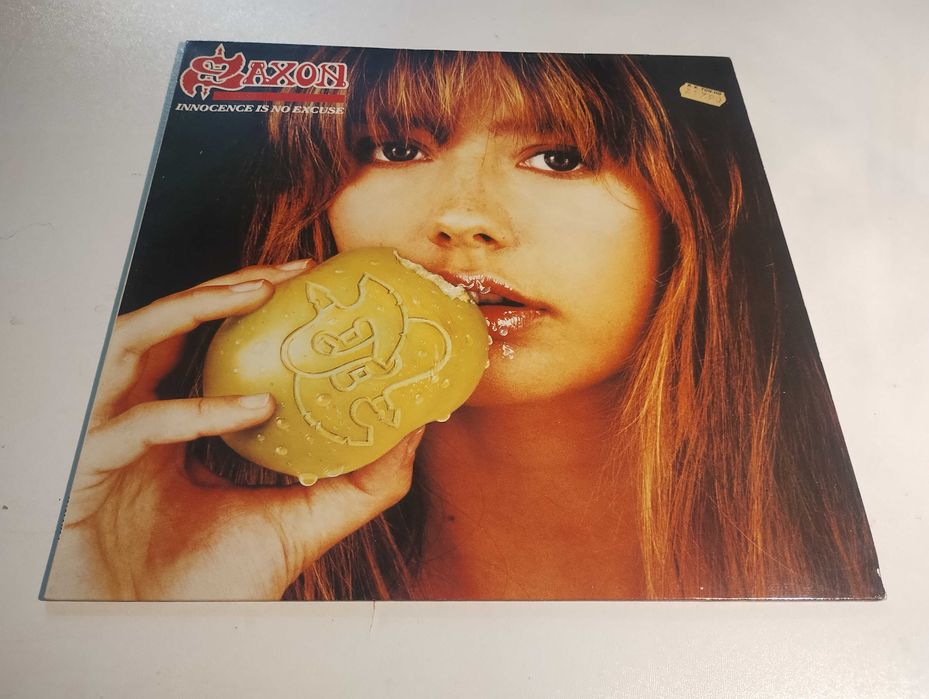 Saxon Innocence is no excuse LP firs press ( near mint )