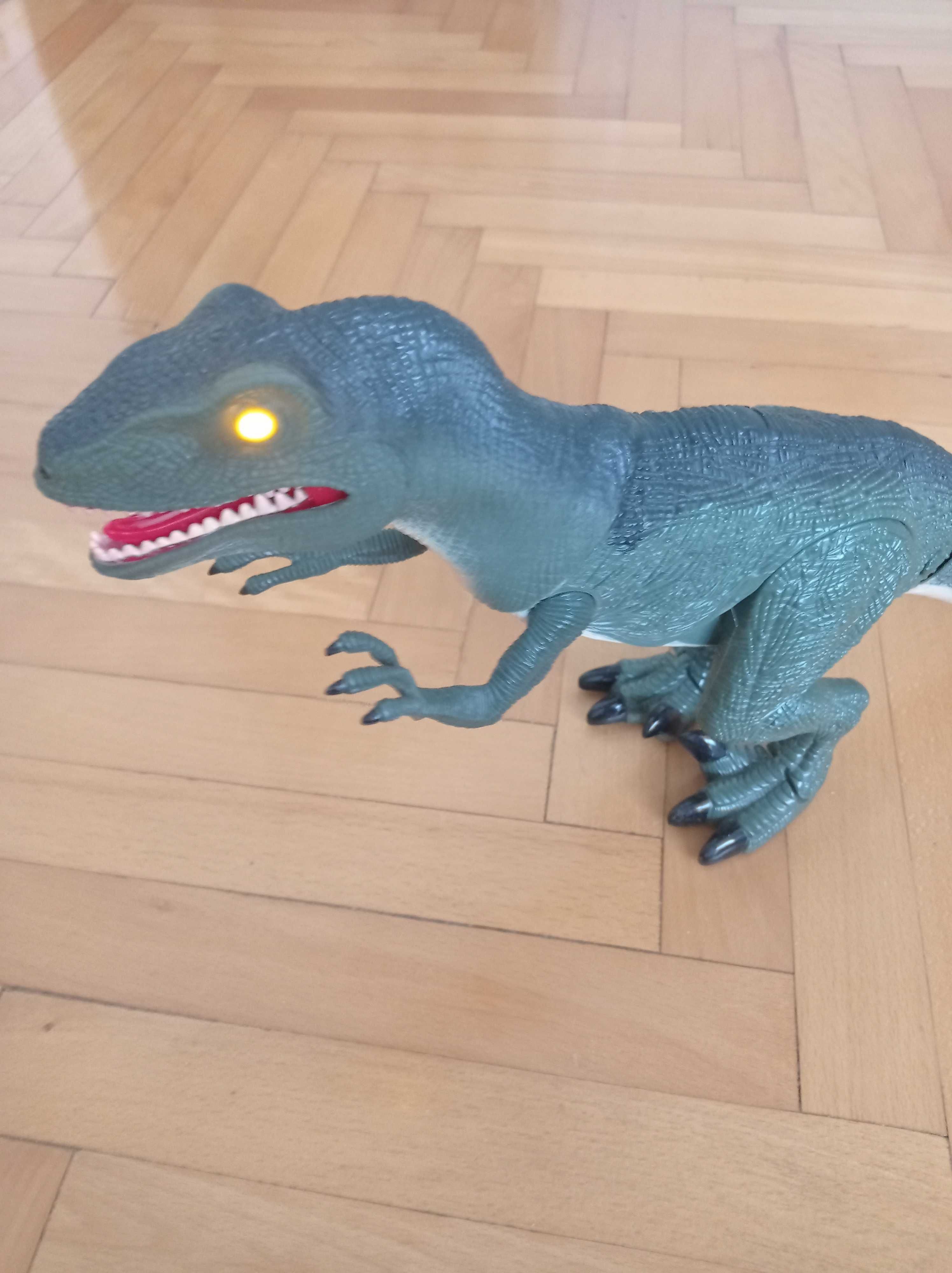 Bardzo duży 30 cm interaktywny dinozaur Velociraptor