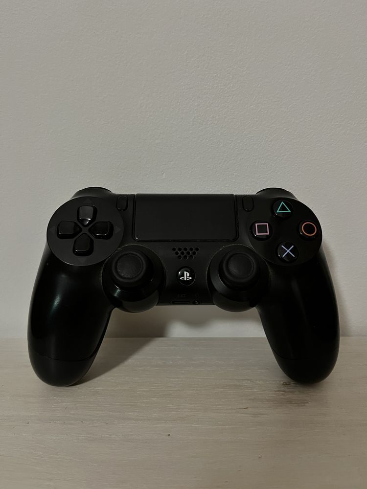 Ігрову консоль PlayStation 4 Pro 1 Tb з гейпадом dualshock 4