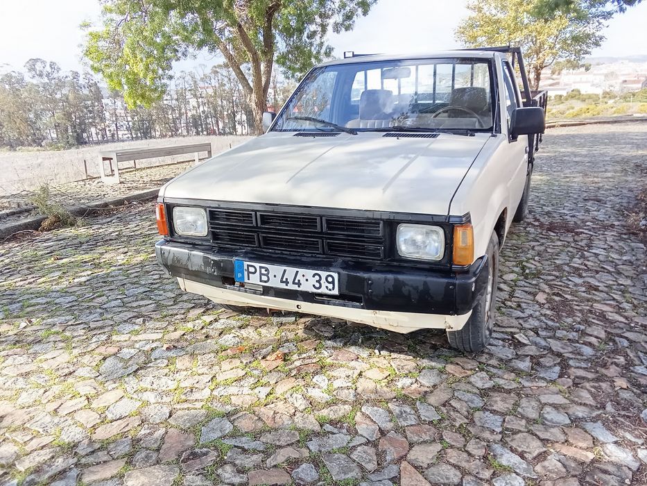 Vendo ou troco Nissan d21