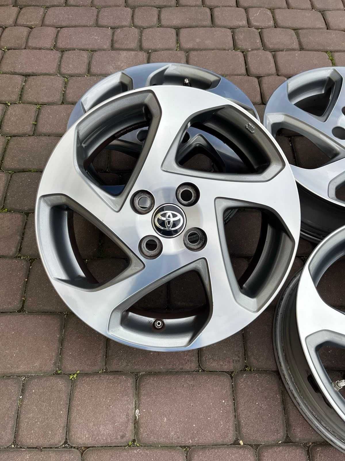 Oryginalne alufelgi Toyota 4x100 15 cali CZUJNIKI Yaris Aygo