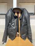 Casaco dainese.