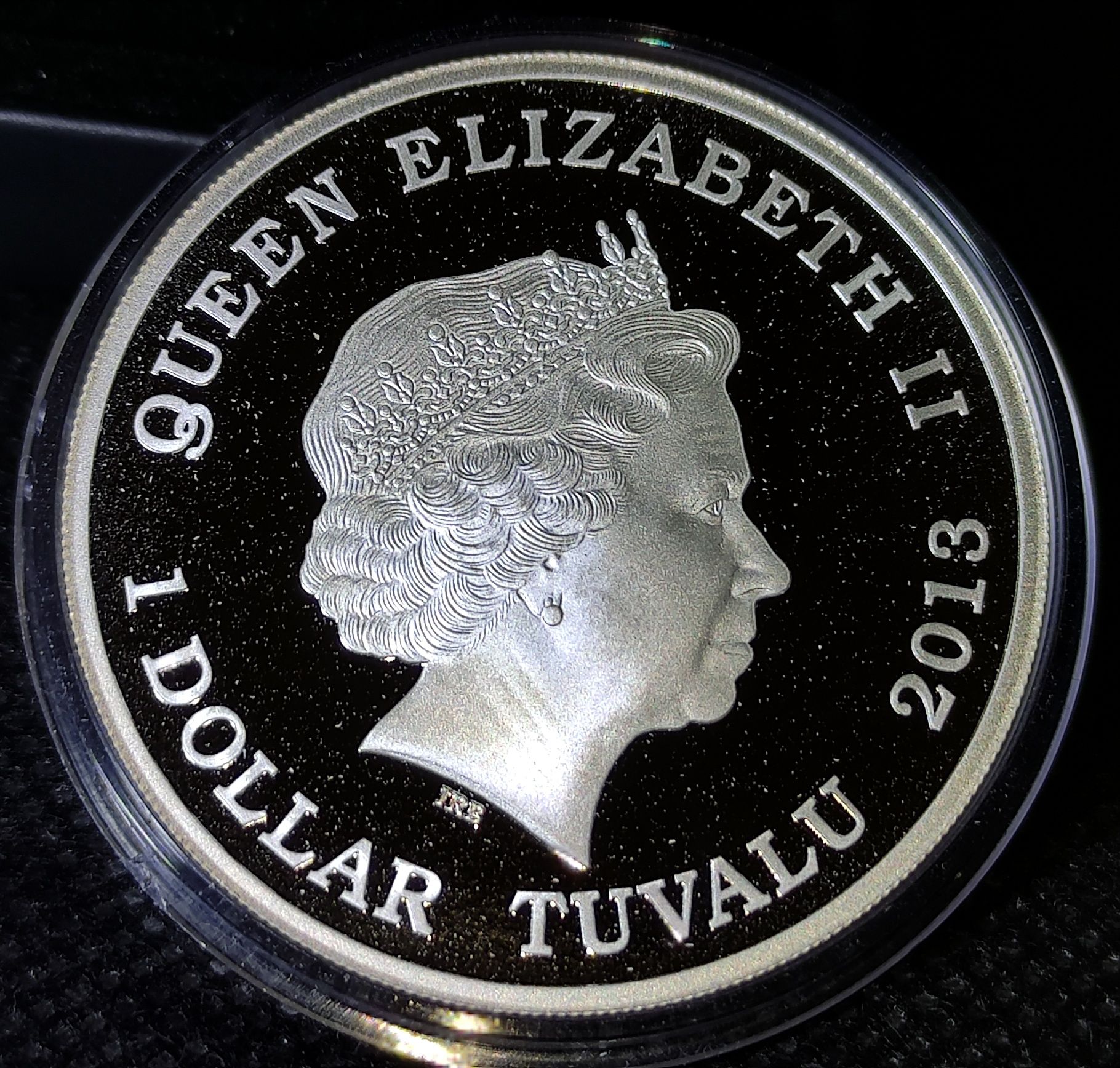 Серебряная монета трехглавый дракон 1 доллар 2013 Тувалу 31,1 грам 999