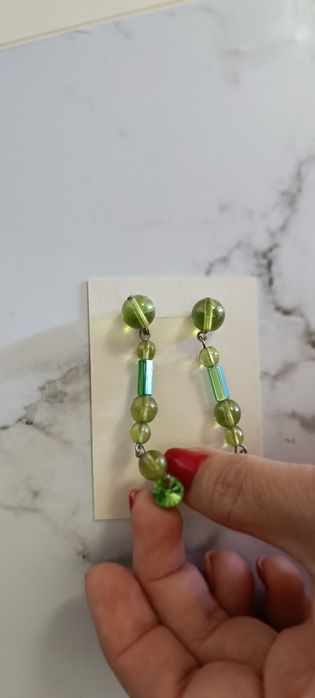 Brincos compridos verdes
Usados 
Em bom estado