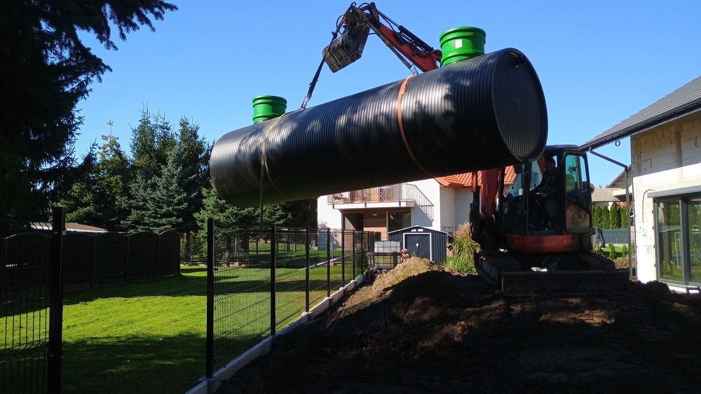 Koparka montaż zbiorników odwodnienia roboty ziemne transport krakow