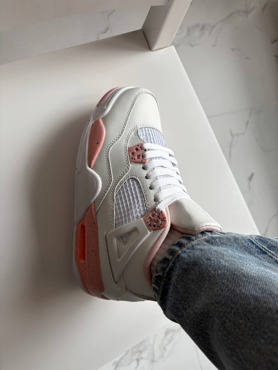 Jordan 4 персикові та фіолетові