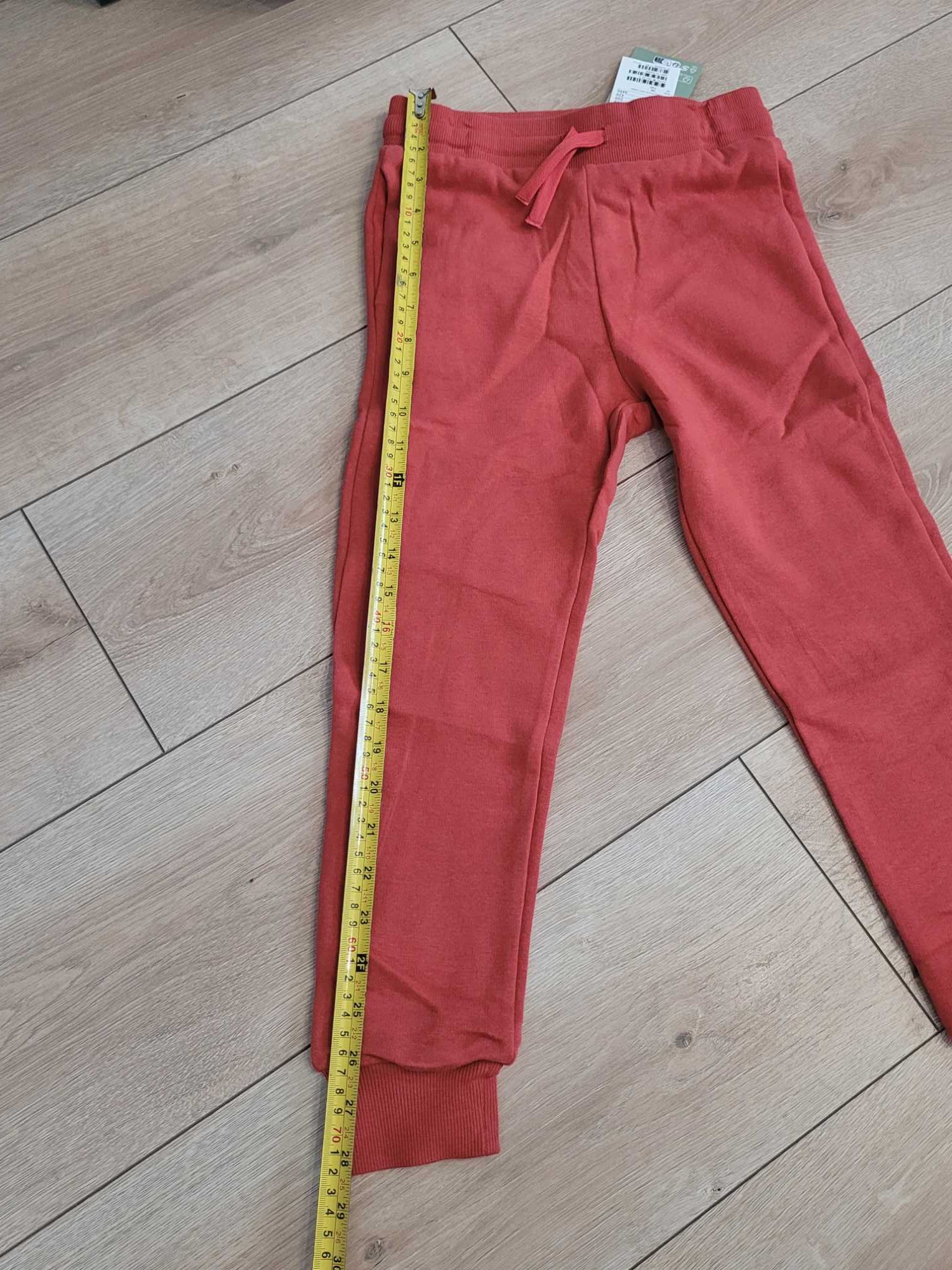 128 Nowe joggery dresowe chłopięce H&M czerwone joggersy z meszkiem