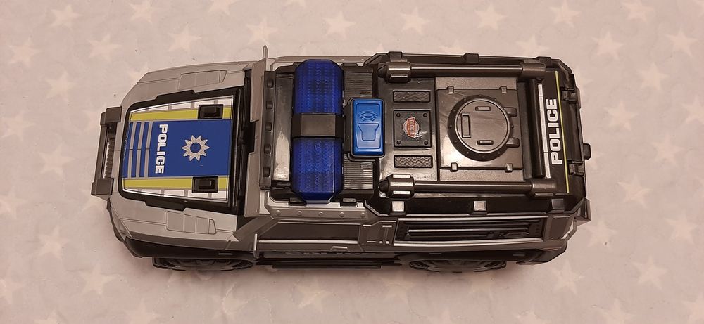 Carro da polícia dickie a pilhas