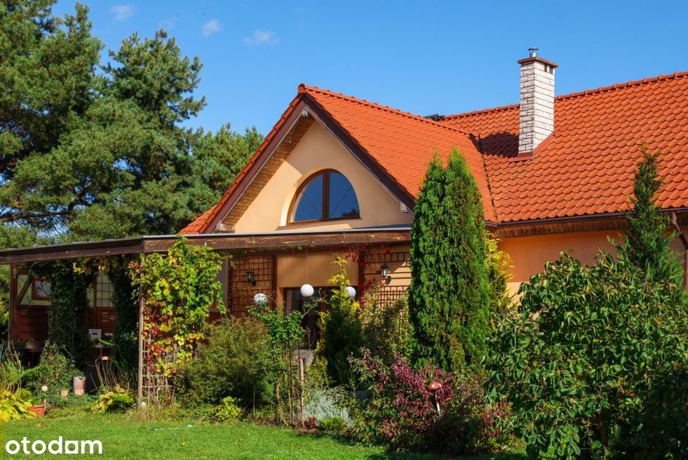 Dom pod Elblągiem z pięknym ogrodem i stawem