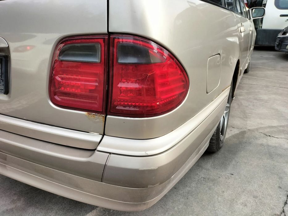 BŁOTNIK LEWY PRAWY MERCEDES W210 LIFT KOD LAKIERU 693
