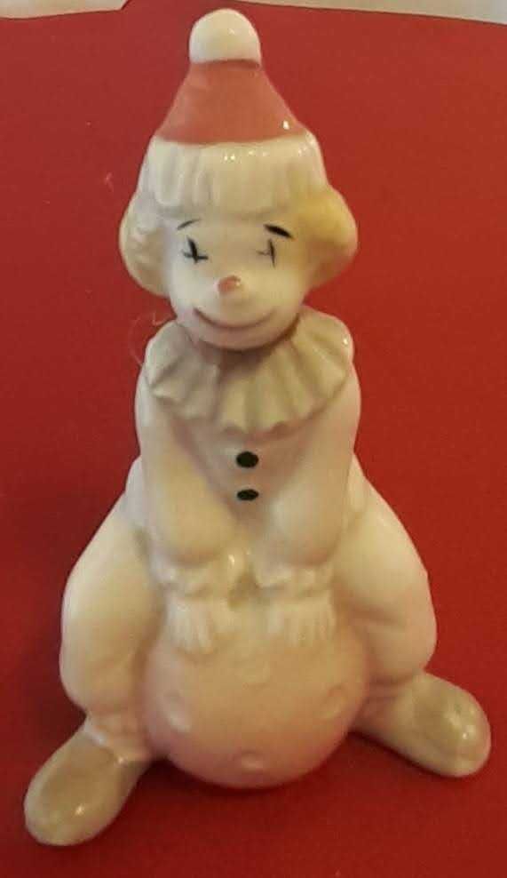 4 Miniaturas Palhaços em porcelana